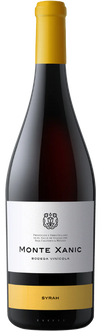Bottle of Monte Xanic Syrah, a bold and spicy Mexican red wine with deep color and refined label, perfect for pairing with grilled meats and hearty dishes.