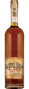 Brinley Gold Shipwreck Spiced Rum bottle with amber liquid, featuring vanilla, nutmeg, and clove notes.