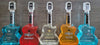 Rock N Roll Tequila Combo 750 ML (5 Bottles) in guitar-shaped bottles, featuring flavors: Añejo Cristalino, Mango, Silver Platinum, Strawberry, and Double Distilled Blue Agave.