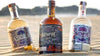 Siempre Tequila Combo 750 ML three bottle set showcasing premium 100% blue weber agave tequila on sand background