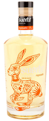 Suerte Reposado Tequila bottle 750ml with rabbit Aztec design.