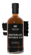 Treaty Oak Waterloo Antique Gin 94 Proof bottle with amber hue and black label.